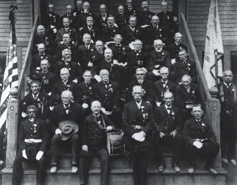 Civil War Veterans gathered for a special photo on the steps of the Albanian Orthodox Church in full uniform of the Grand Army of the Republic, undated. (NHS Collections)